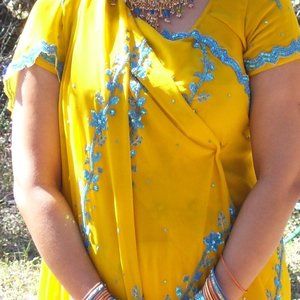 yellow georgette saree with Blue embroidery